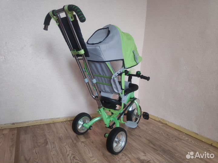 Детский трехколесный велосипед с ручкой moby kids