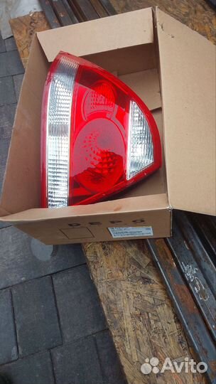 Фонарь задний левый