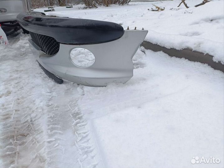 Передний бампер Peugeot 206