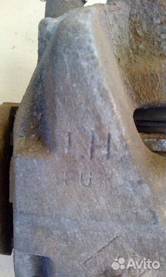 Суппорт тормозной передний левый Renault Megane