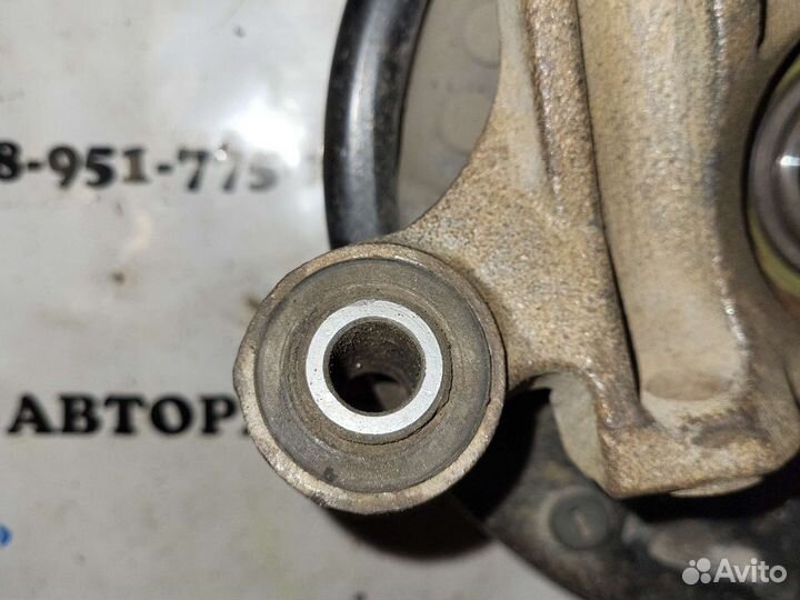 Кулак поворотный задний левый Nissan sunny 4wd