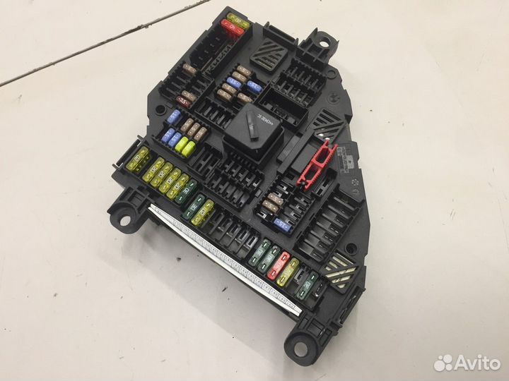 Блок предохранителей салонный задний (BMW X3)