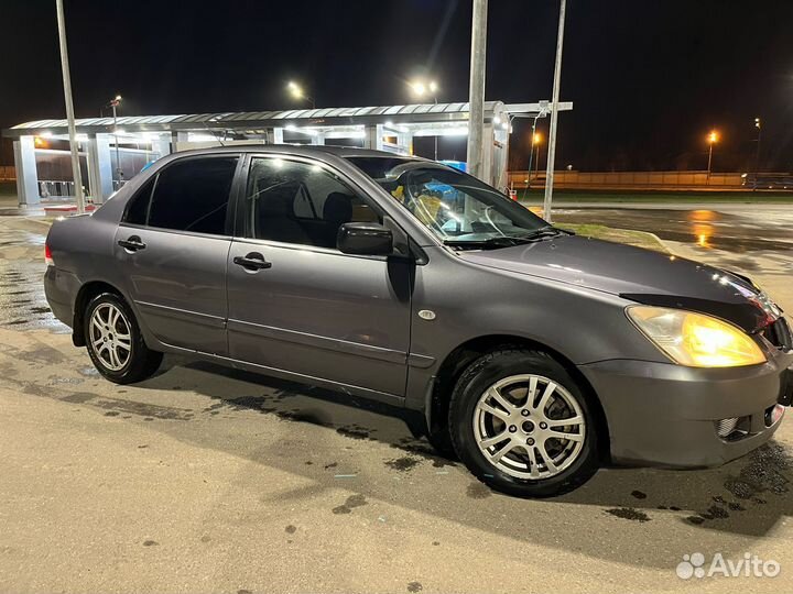Mitsubishi Lancer 1.3 МТ, 2005, 300 000 км