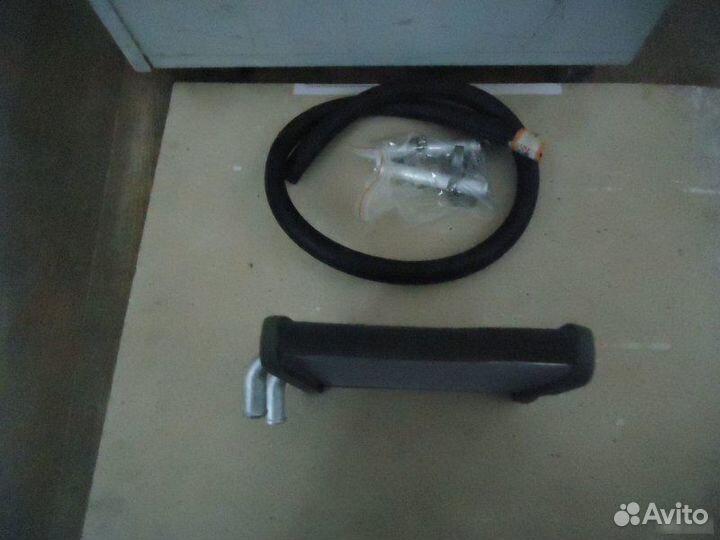 Радиатор печки Mazda Demio