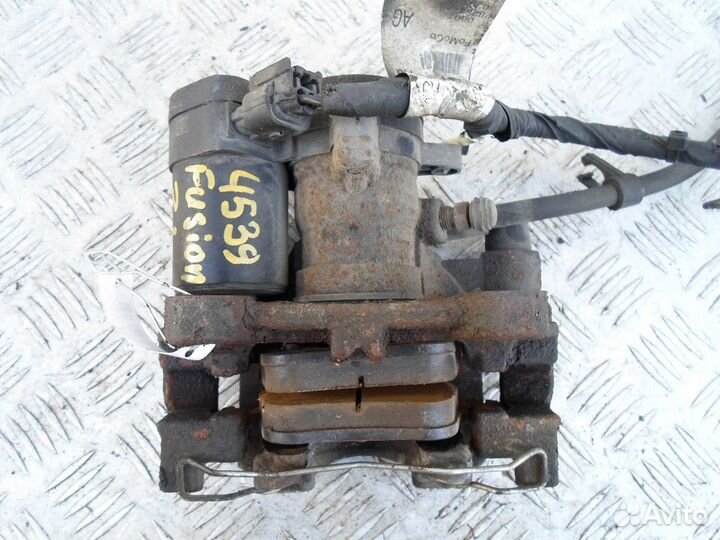 Суппорт задний левый Ford Fusion 2 USA