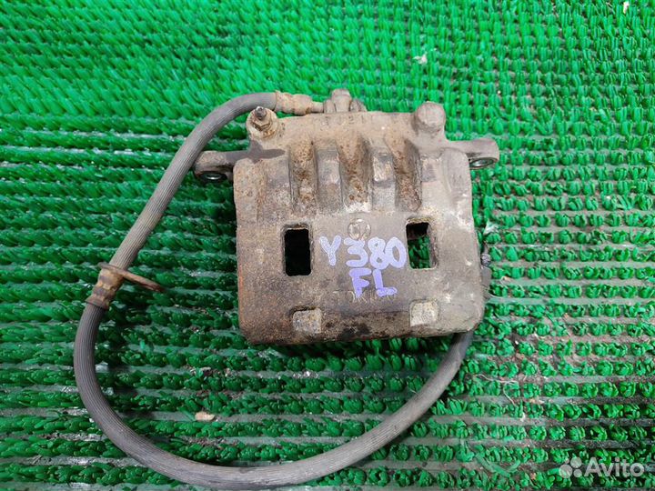 Суппорт тормозной передний левый Subaru Legacy/ O