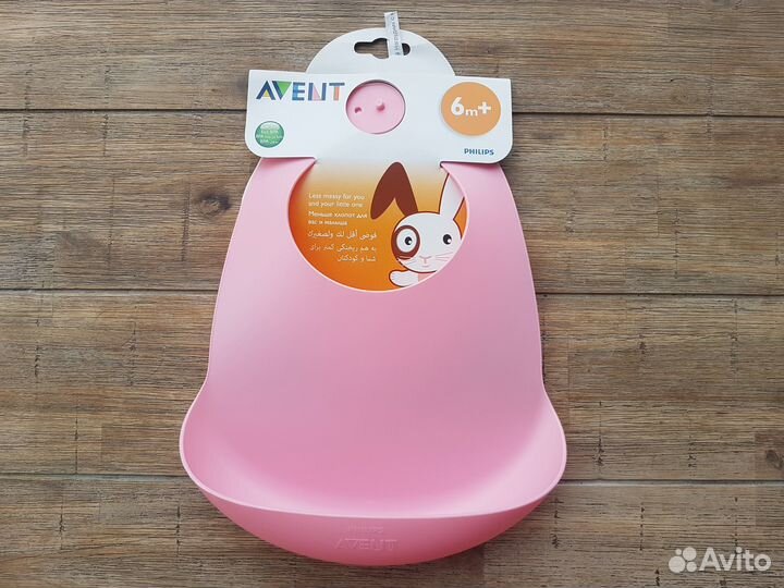 Нагрудник пеликан из пластика с карманом 1 шт