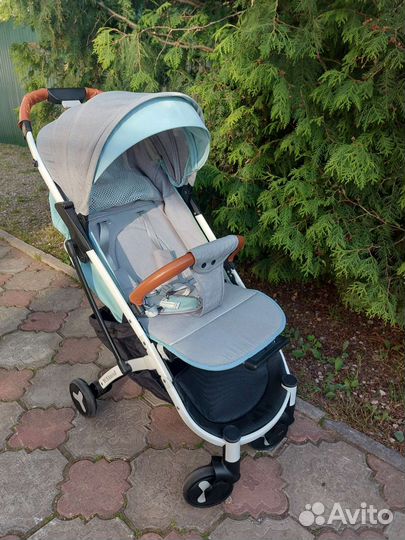 Детская прогулочная коляска yoya
