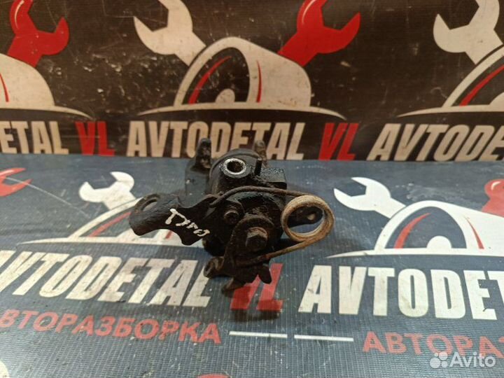 Суппорт тормозной задний левый Volkswagen Passat