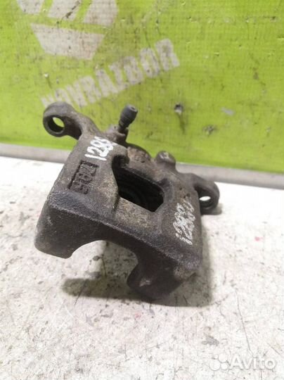 Суппорт задний правый Ниссан Теана