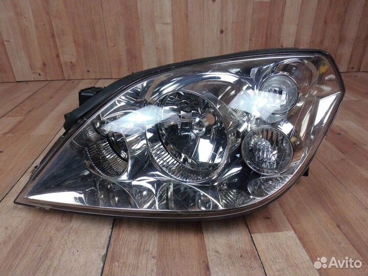 Фара левая Nissan Primera P12E 2002-2007