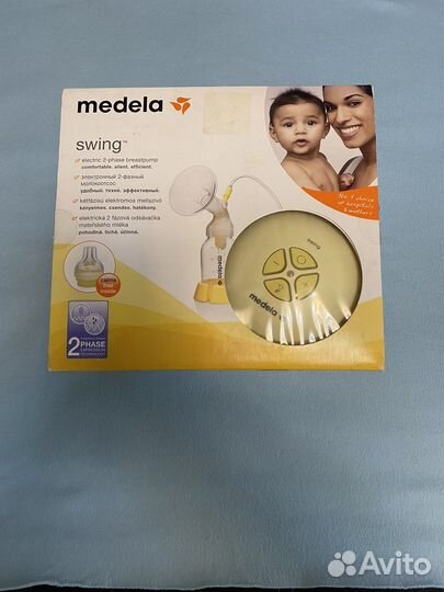 Молокоотсос medela электрический