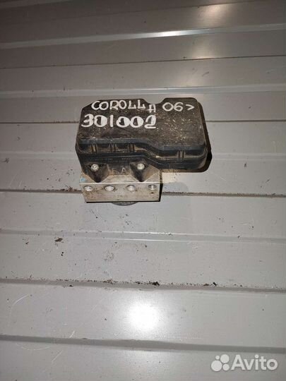 Блок ABS Toyota Corolla E15