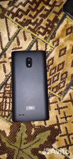 Телефон Fly FS402