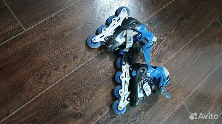 Роликовые коньки