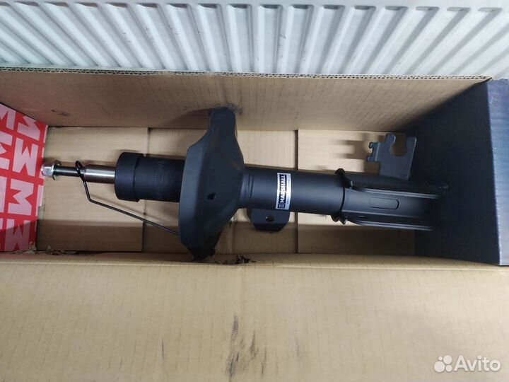 Передние стойки Лачетти