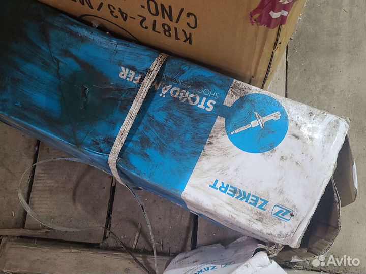 Задний правый амортизатор мазда 323