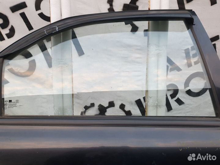 Стекло заднее правое Kia Spectra