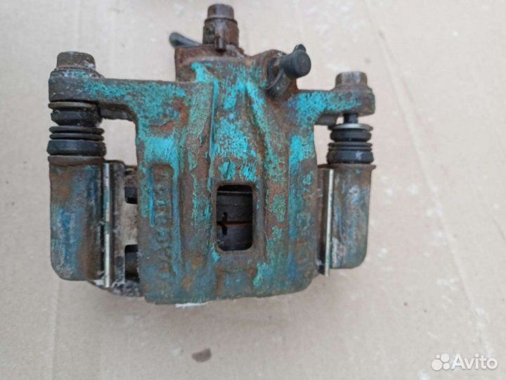 Суппорт тормозной задний левый Chevrolet Lacetti