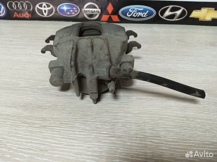 Суппорт тормозной передний правый Ford Focus MK1