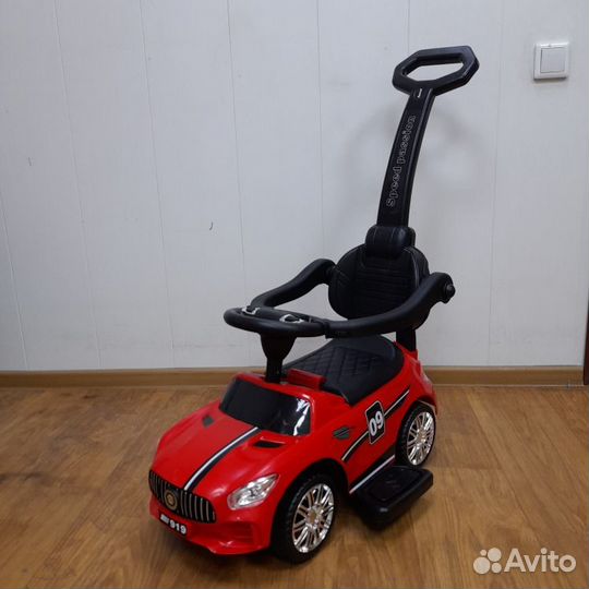 Игрушка каталка с ручкой