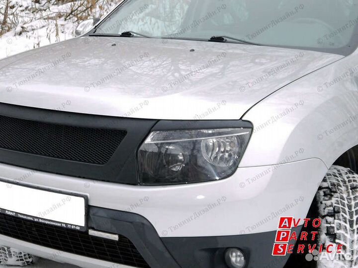 Реснички на фары Renault Duster