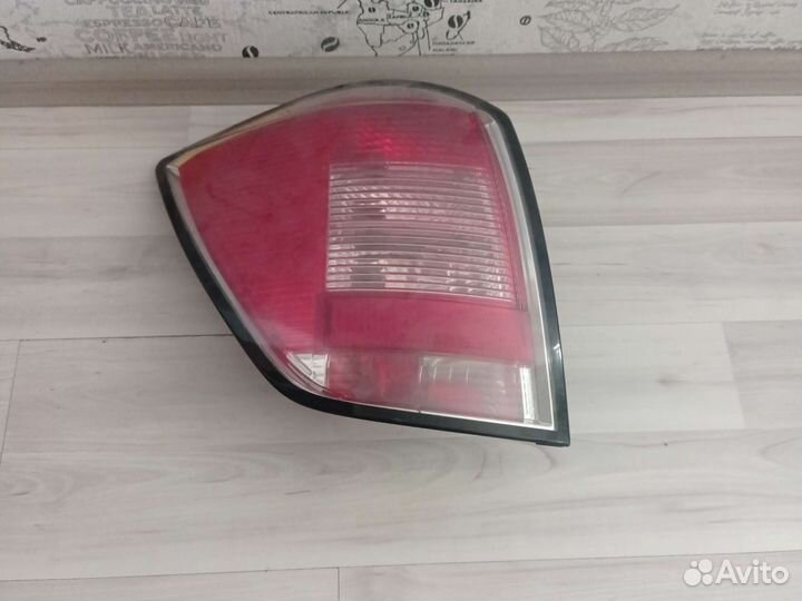 Фонарь задний левый Opel Astra H универсал