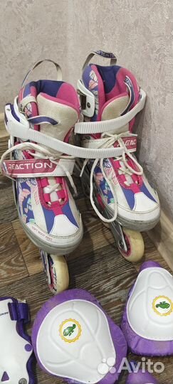 Роликовые коньки