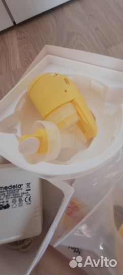 Электрический молокоотсос medela
