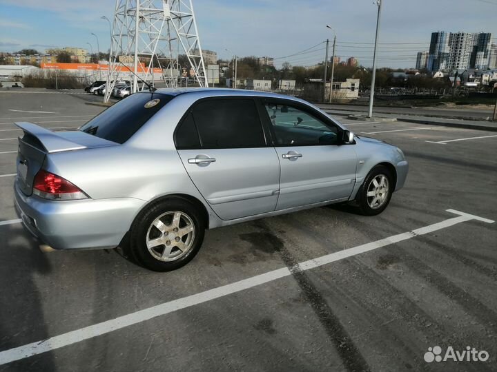 Mitsubishi Lancer 1.6 AT, 2005, 262 500 км