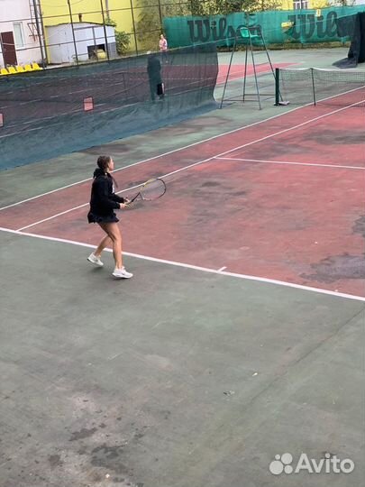 Тренер по большому теннису