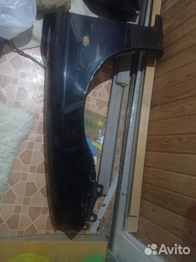 Крыло левое переднее Kia Spectra
