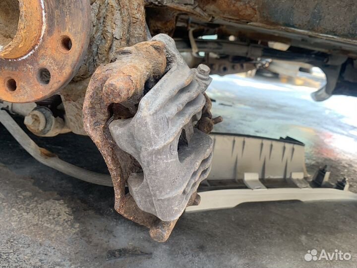 Суппорт задний левый Opel Zafira A