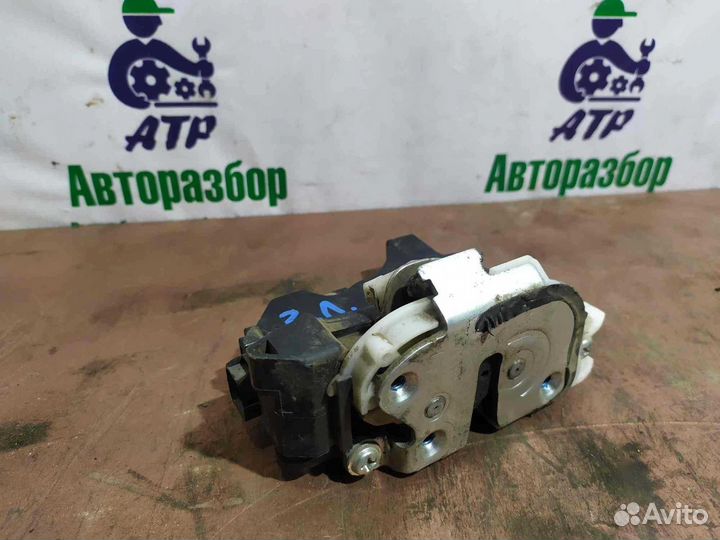 Замок задний левый Mitsubishi Lancer X