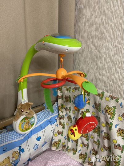 Музыкальная карусель для детской кроватки