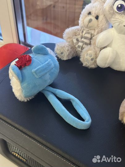 Мягкие игрушки и рюкзак в виде собачки