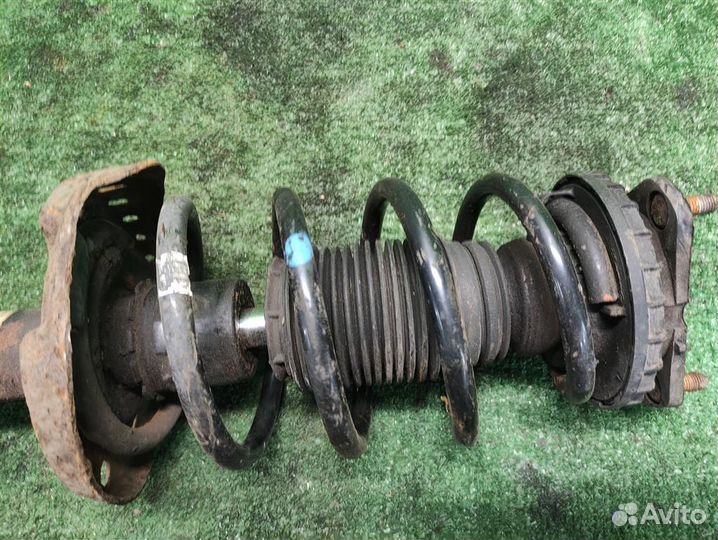 Стойка амортизатора передняя левая Honda Civic 5D