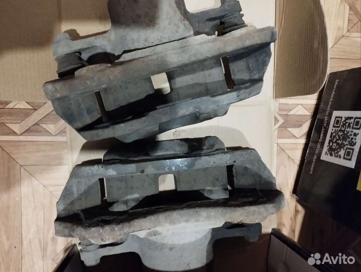 Суппорта передние лансер 9