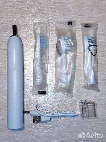 Электрическая зубная щетка ультразвуковая