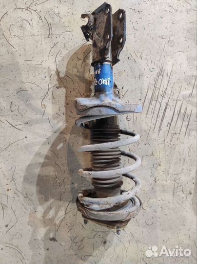 Стойка передняя левая в сборе Mazda 323 2001 рест