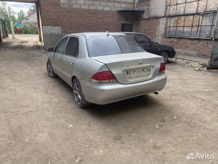 В полном разборе Mitsubishi Lancer 9 1.6 2006год