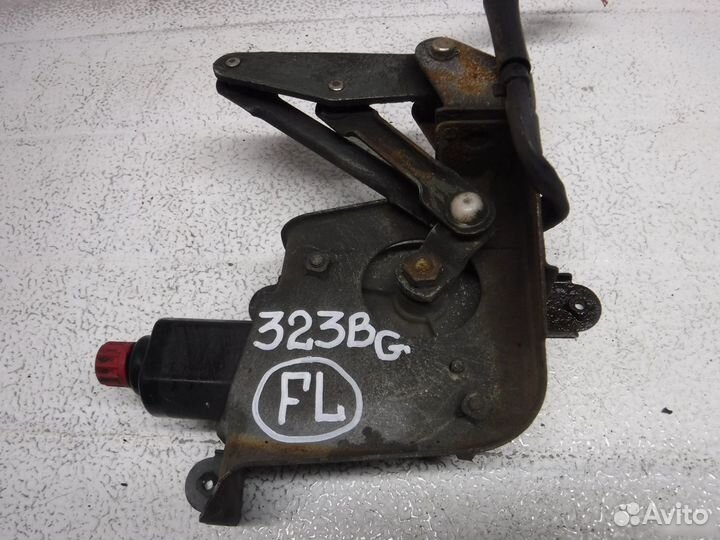 Моторчик стеклоочистителя фары Mazda 323