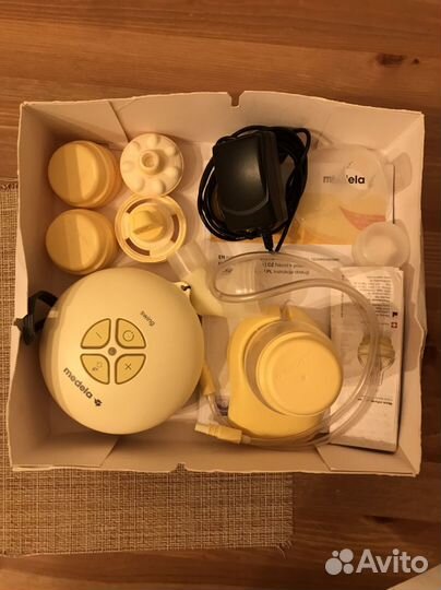 Молокоотсос medela swing