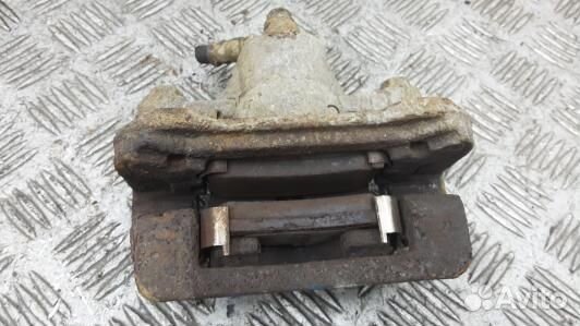 Суппорт тормозной задний левый KIA CEE'D 1 (ASE17L