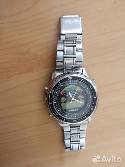 Часы sharp