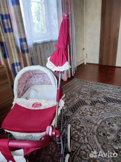 Игрушечная коляска