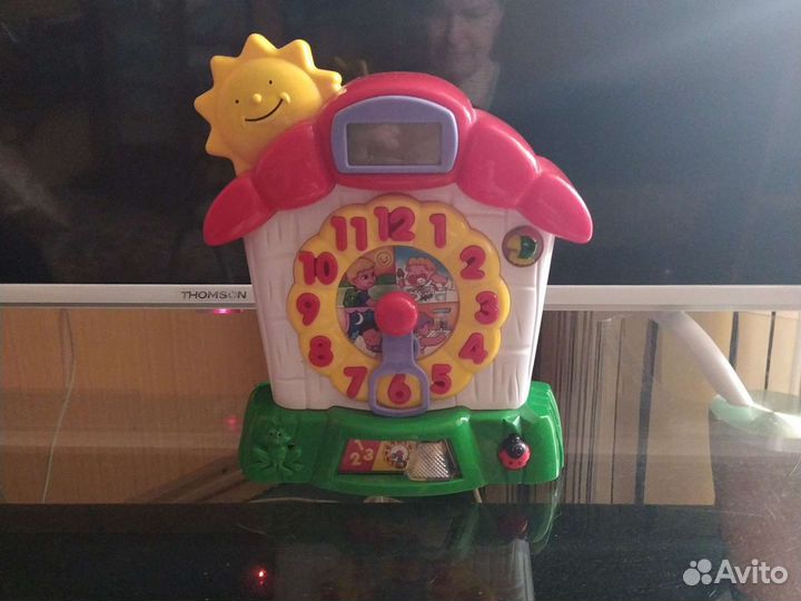 Занимательная игрушка часы