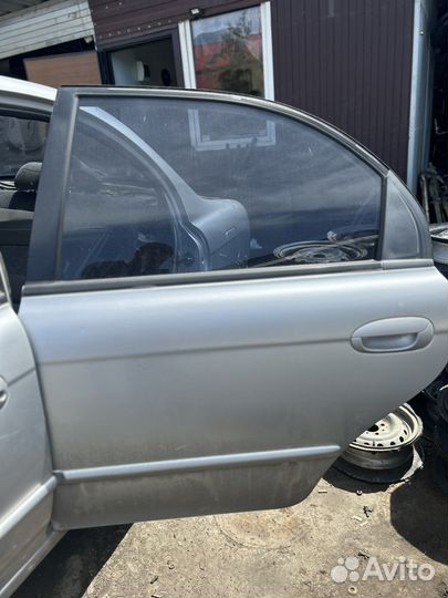 Задняя левая дверь Киа Спектра