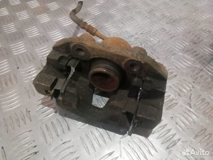 Тормозные суппорта переднее Chevrolet Lanos 1.5