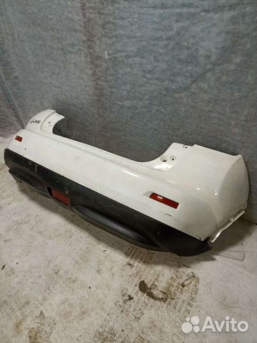 Бампер задний Ниссан жук